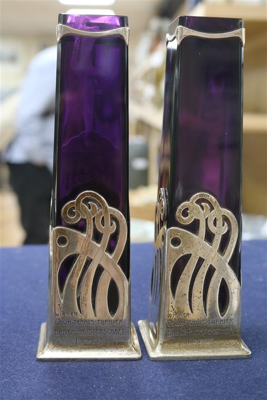 A pair of Austro Hungarian Art Nouveau 800 standard white metal mounted amethyst glass vases.